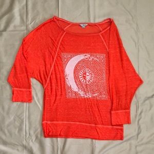 Orange long sleeved graphic T-shirt